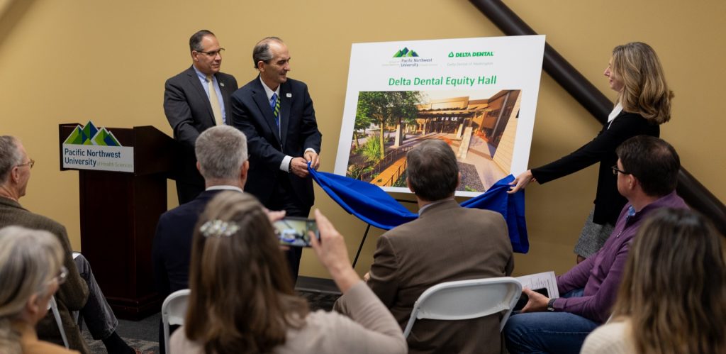 Revealing a rendering of Dental Dental Equity Hall at PNWU groundbreaking ceremony
